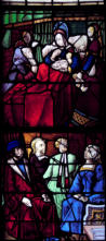 Baie 17: Vie de Saint Remi - 2 hommes et 2 femmes assis - Le saint ermite Montan, aveugle, est miraculeusement guéri par du lait touché par Saint Remi