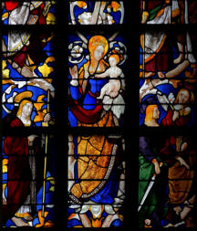 La Vierge offrant une poire à Jésus, le Christ tenant la Croix, Jacques le Majeur et saint Jean l'Evangéliste, Saint Simon et Joseph le Juste (?)  